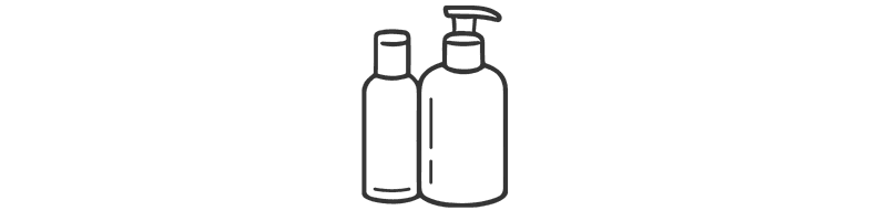 Two skincare bottles, one with a pump and one with a flip cap.