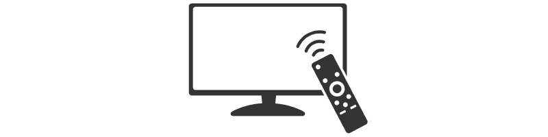 A computer monitor with a spray bottle aimed at it.